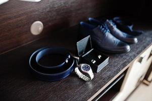 Close up of groom accessories. Wedding details. Man's style. photo