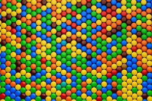 Colorful candy pattern Colorful chocolate candy top viewbackgrounds 3d illustration photo