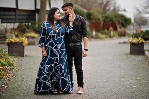 Love story of indian couple posed outdoor. photo