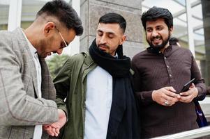 Group of pakistani man wearing traditional clothes salwar kameez or kurta. photo