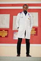 African american doctor student male at lab coat with stethoscope inside medical university. photo