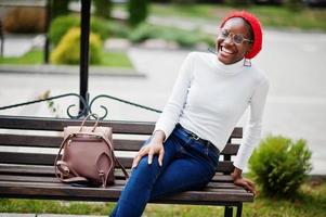 Young modern fashionable, attractive, tall and slim african muslim woman in hijab or turban head scarf posed. photo