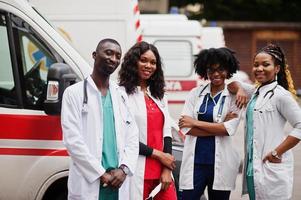 Group of african paramedic ambulance emergency crew doctors. photo