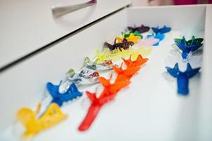 Different colored dentist tools at dental office. photo