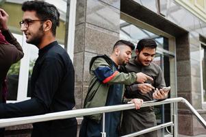 Group of pakistani man wearing traditional clothes salwar kameez or kurta. photo