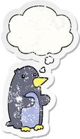 cartoon penguin and thought bubble as a distressed worn sticker vector