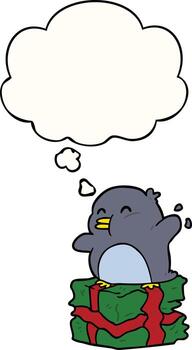 pingüino de dibujos animados en presente y burbuja de pensamiento vector