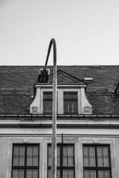 old house facade with a lantern photo
