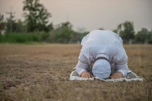 Asian islam man prayer,Young Muslim praying,Ramadan festival concept photo