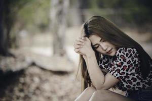 Beautiful thai woman very sad from unrequited love,rethink,think over,vintage style,dark tone,broken heart,asian girl photo