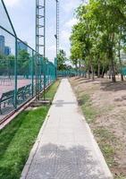 Pathway near the tennis court photo