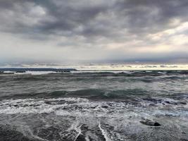 playa el sol se ha puesto océano relajación foto