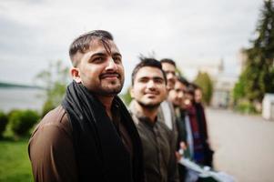 Group of pakistani man wearing traditional clothes salwar kameez or kurta. photo