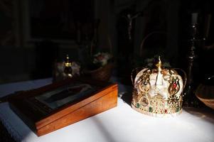 Wedding crown in orthodox church at ceremony. photo