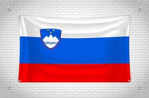 Slovenia flag hanging on brick wall. 3D drawing. Flag attached to the wall. Neatly drawing in groups on separate layers for easy editing. vector