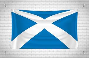 Scotland flag hanging on brick wall. 3D drawing. Flag attached to the wall. Neatly drawing in groups on separate layers for easy editing. vector