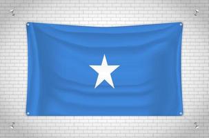 Somalia flag hanging on brick wall. 3D drawing. Flag attached to the wall. Neatly drawing in groups on separate layers for easy editing. vector