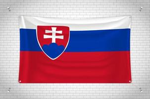 Slovakia flag hanging on brick wall. 3D drawing. Flag attached to the wall. Neatly drawing in groups on separate layers for easy editing. vector