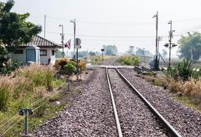 Railway intersection with the automatic barrier. photo