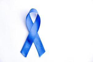 Blue ribbon in white background photo