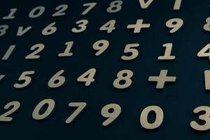 Colorful wooden colorful numbers background. Numbers texture abstraction. Global economy crisis concept photo