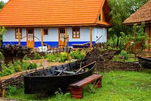 rural house made of clay and clay roof. The ideal country house for rest and relaxation in the bosom of nature photo