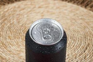 black aluminum can, with drops of water photo