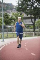 Senior runner on street photo