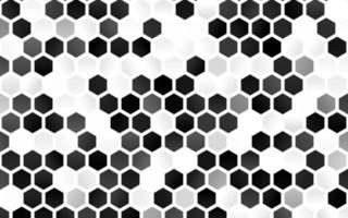 Fondo de vector gris plateado claro con hexágonos.