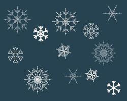 linda colección vectorial de copos de nieve para tarjetas de felicitación de navidad y año nuevo. vector