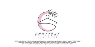 Boutique logo with flower line art illustration premium vector