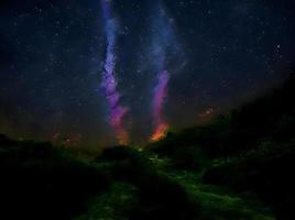 Milky Way galaxy, on high mountain Long exposure photograph, with grain. Image contain certain grain or noise and soft focus. photo