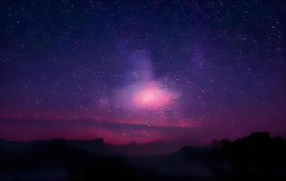 night landscape mountain and milkyway galaxy background , long exposure , low light photo