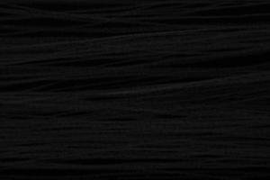 Horizontal background with copy space. Texture closeup - black photo