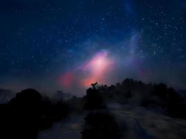 Milky Way galaxy, on high mountain Long exposure photograph, with grain. Image contain certain grain or noise and soft focus. photo