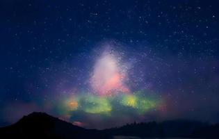 Night landscape with colorful Milky Way and mountains. Starry sky with hills at summer. Beautiful Universe. Space background photo