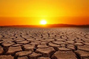 Global warming, drought, lack of rain, no seasonality The land is cracked. concept of environment change and global warming photo