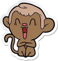 sticker of a cartoon laughing monkey vector