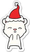 happy sticker cartoon of a polar bear wearing santa hat vector