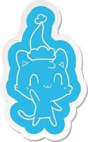 cartoon  sticker of a happy cat wearing santa hat vector