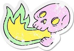 distressed sticker of a fire breathing quirky hand drawn cartoon skull vector