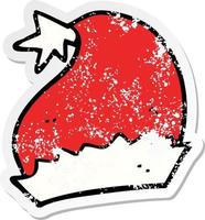 distressed sticker of a cartoon santa hat vector