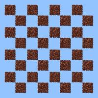 Squares from coffee grains on blue background. A pattern in the form of a chessboard of coffee beans poured in the form of squares. photo