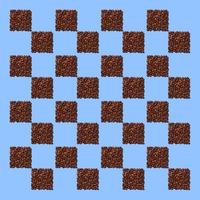 Squares from coffee grains on blue background. A pattern in the form of a chessboard of coffee beans poured in the form of squares. photo