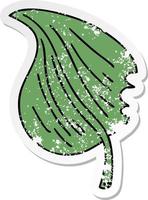 distressed sticker of a quirky hand drawn cartoon munched leaf vector