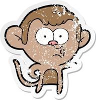 distressed sticker of a cartoon pointing monkey vector