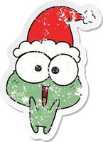 christmas distressed sticker cartoon of kawaii frog vector
