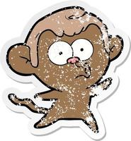 distressed sticker of a cartoon surprised monkey vector