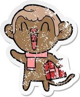 distressed sticker of a cartoon laughing monkey vector