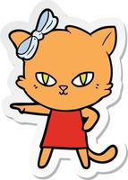 sticker of a cute cartoon cat wearing dress vector